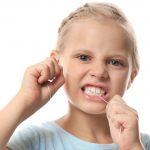 A Parents Guide To Flossing | Dentistry On Carmel | Charlotte NC